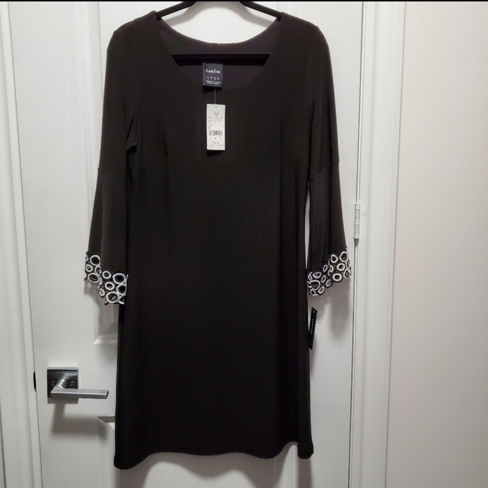 Elegant Cartise A-line dress featuring 3/4 bell sleeves